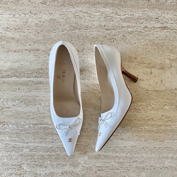 CHANEL Shoes - Vintage Chanel Gold CC Bow Pumps